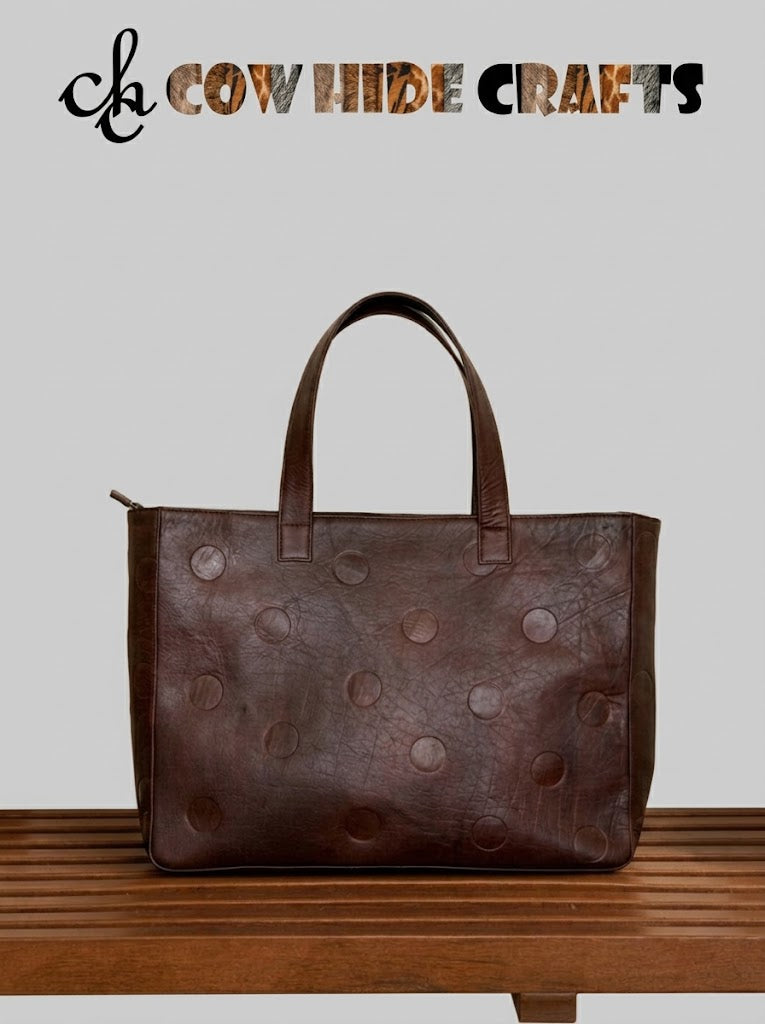 Debossed polka-dot leather work tote in oxblood brown