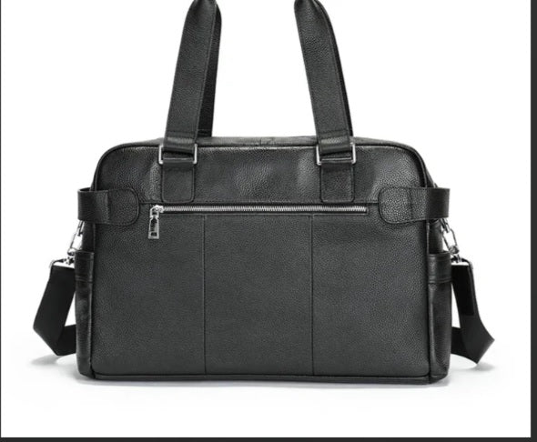 Top handle drop height detail on executive leather briefcase