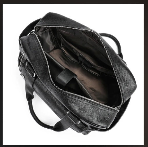 Padded laptop compartment inside pebbled leather briefcase