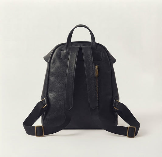 Back panel zip pocket detail on vintage leather flap backpack