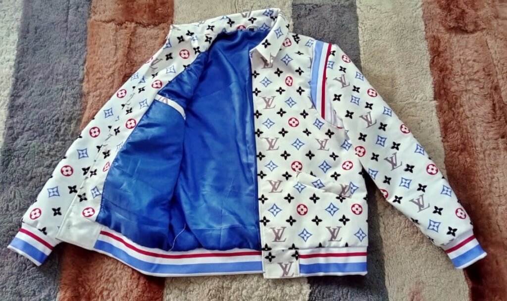 Handcrafted velvet bomber jacket with floral design print