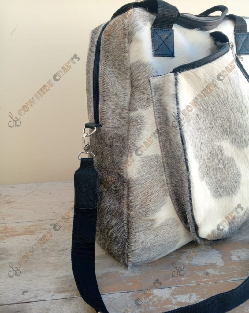 Grey white cowhide tennis bag side view