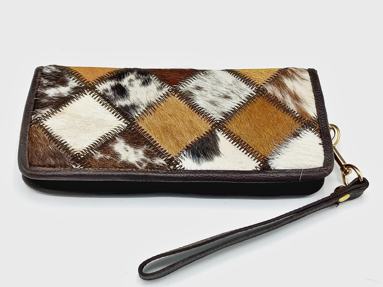 Hair-on cowhide patchwork wallet front view with diamond checkerboard pattern
