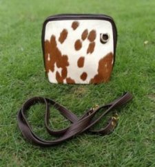 Hair on cowhide shoulder bag front view