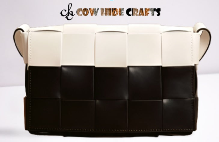 Hidden magnetic closure detail on two-tone patchwork leather bag