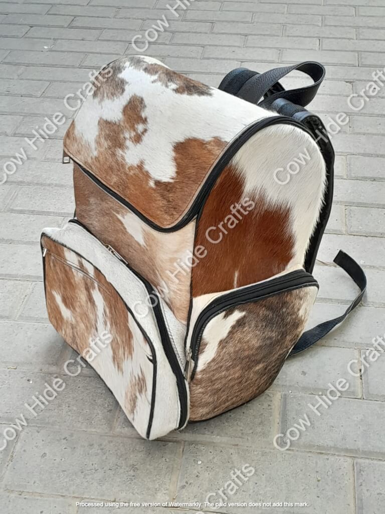 Honey brown cowhide rucksack top handle backside straps