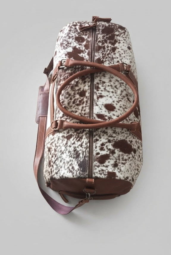 Large hair-on cowhide travel duffle bag with leather handles