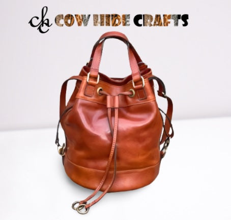 Leather drawstring bucket bag snap closure women