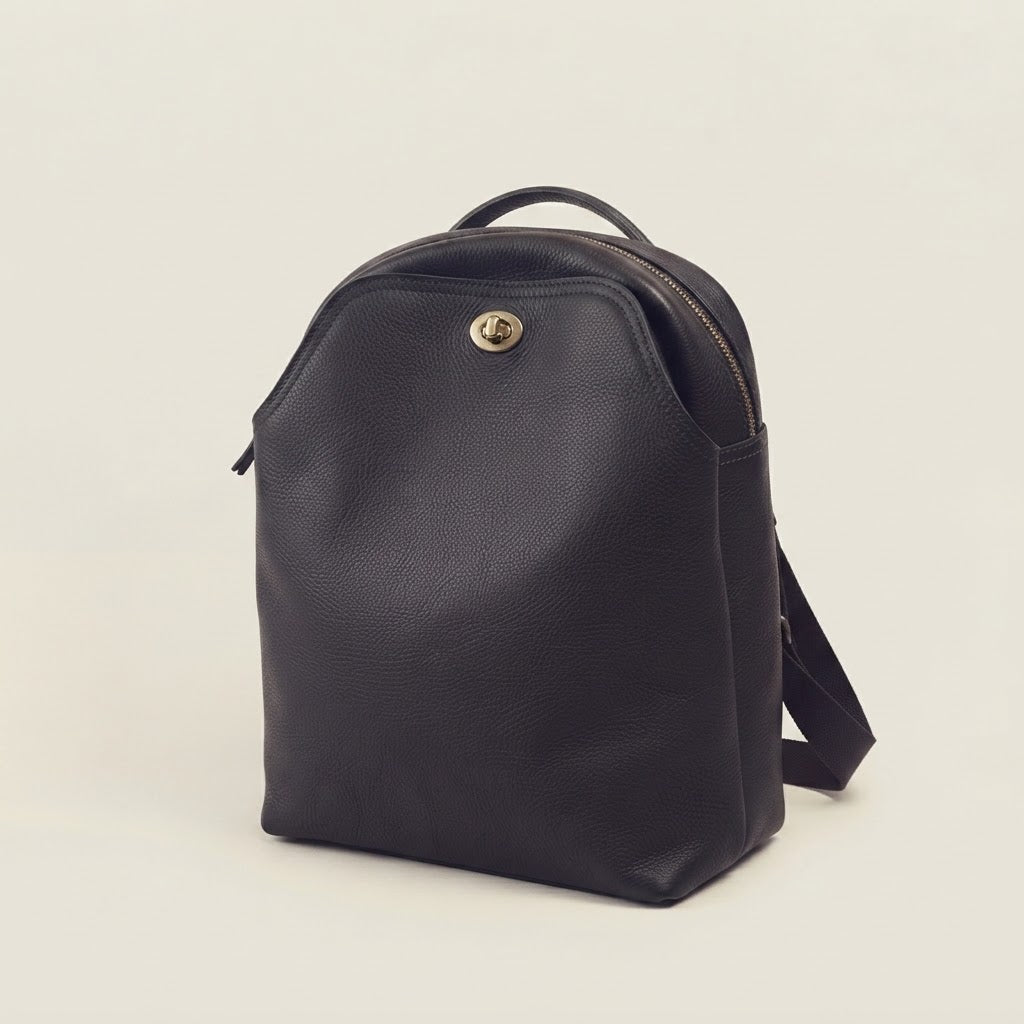 Leather flap backpack with turn-lock closure in black
