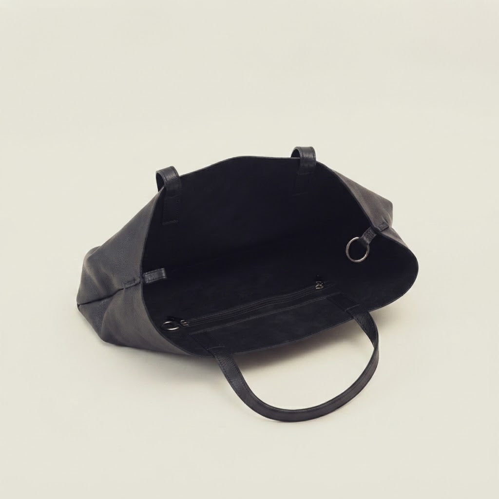 Interior wall pocket detail inside leather hobo tote set