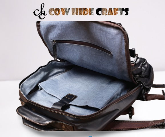 black leather laptop backpack with padded sleeve