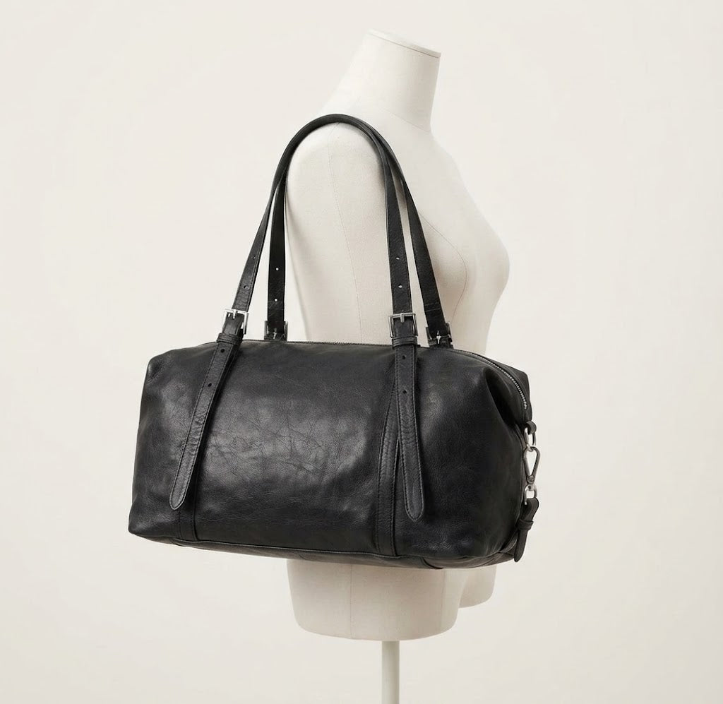 Minimalist leather underarm mini duffle bag in black