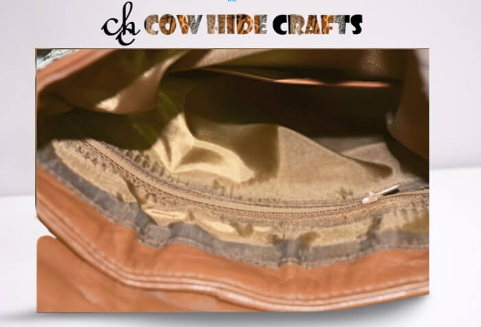 Long cowhide crossbody bag interior essentials