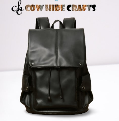 Magnetic snap and drawstring closure on black leather backpack