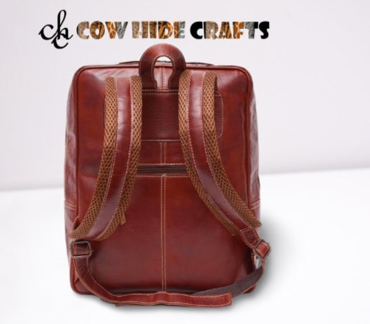 Maroon leather hiking backpack with cowhide detail