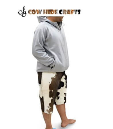 Men's brown and white cowhide three quarter shorts with button closure