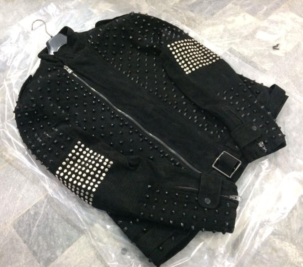 Black leather jacket with silver metal spike rivets
