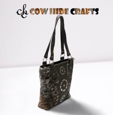 Metal rivets cowhide handbag detail