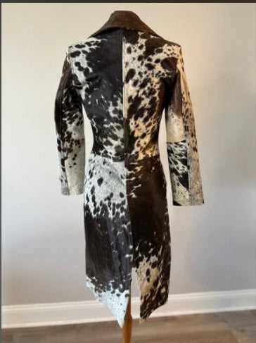 Back view of mid-length patchwork cowhide trench coat