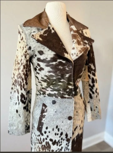 Mid-length patchwork cowhide trench coat front view