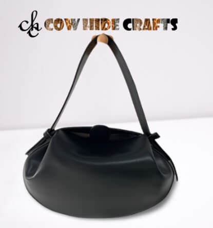 Mini black leather shoulder purse snap closure front view