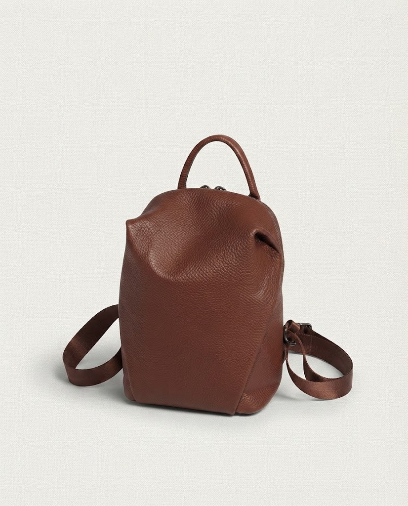 Mini leather conversion backpack in brown colorway