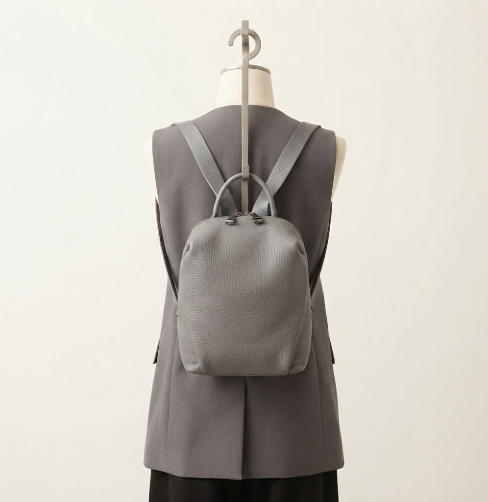Mini leather conversion backpack in grey colorway