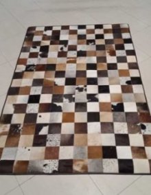 Mosaic cowhide patchwork rug brown white