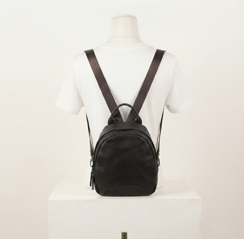 Multi-zipper leather utility backpack in black