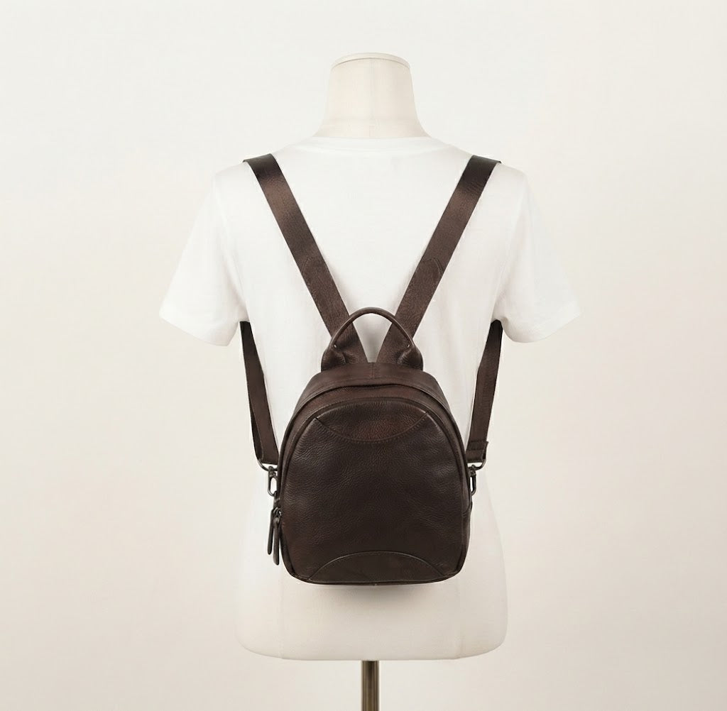 Multi-zipper leather utility backpack in brown
