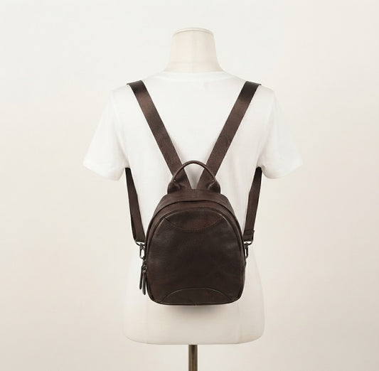 Multi-zipper leather utility backpack in brown