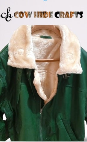 Close-up of cream faux fur collar on an olive green aviator jacket