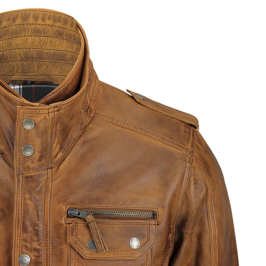 Outside pockets on hip length tan waxed leather jacket