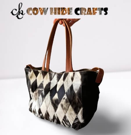 Patchwork cowhide bag spike design black white