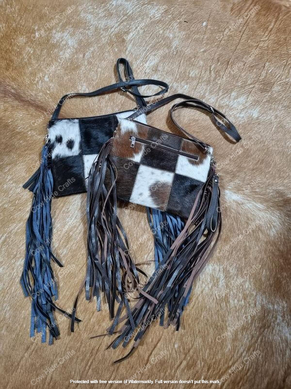 Patchwork cowhide partywear clutch long flowing fringe