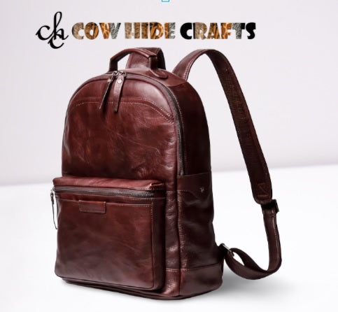 Pebbled leather backpack front utility pocket horizontal slip pouch