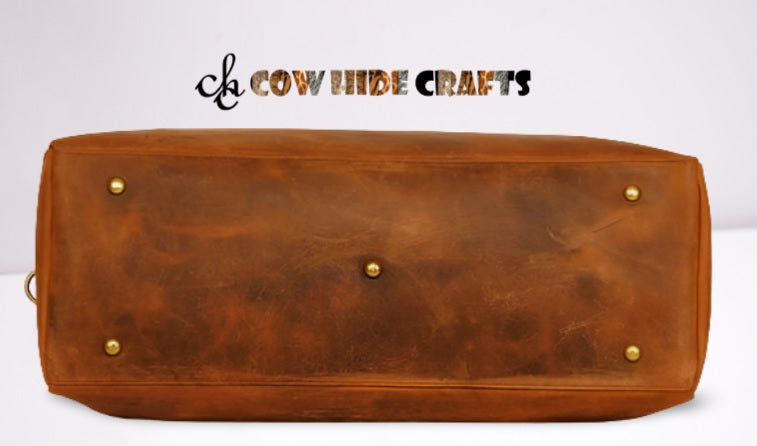 Premium vintage brown leather curvy duffle bag rivets base