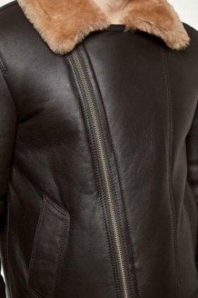Side view of RAF brown leather bomber jacket with asymmetrical zipper and waist adjusters