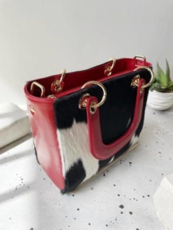 Red cowhide bag dual handles metal eyelets