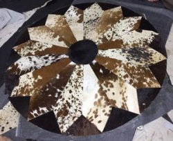 Round patchwork cowhide rug sphere shape