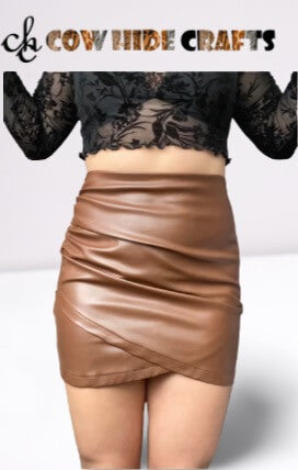 Tan leather ruched mini skirt with asymmetrical tulip hem