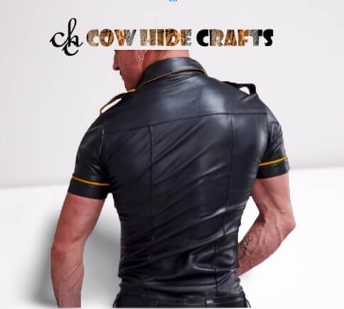 Shoulder epaulets and stud button on black leather shirt