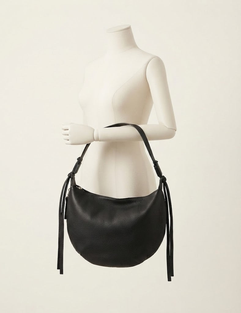 Slouchy leather dumpling crescent bag in black