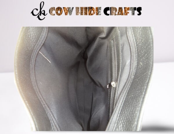 Solid black cowhide fringe bag inside view