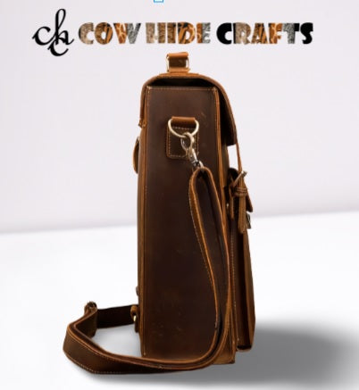 Structured leather backpack with buckle flap