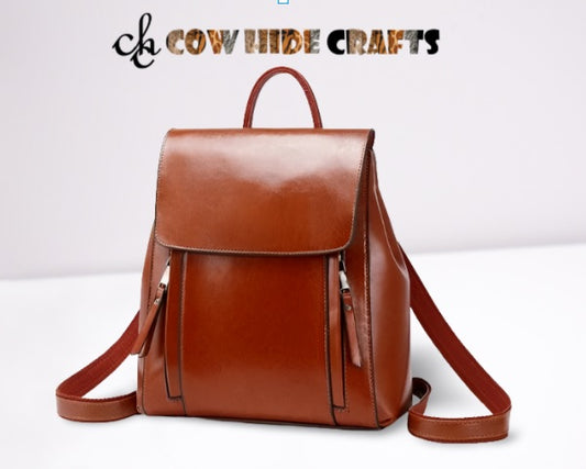 Tan brown leather convertible backpack shiny