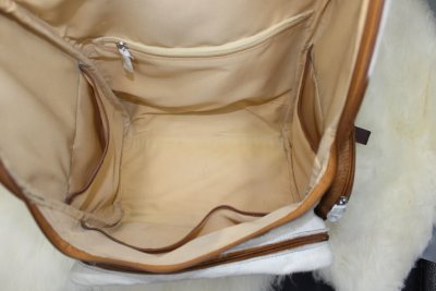 Tan cowhide backpack diaper slits interior