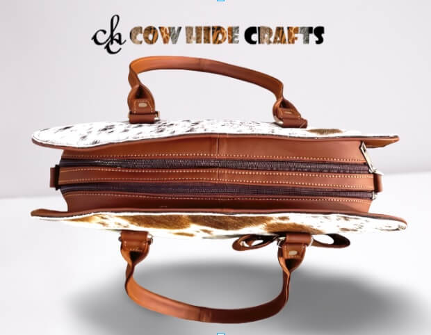 Tan cowhide bag double zipper top compartments