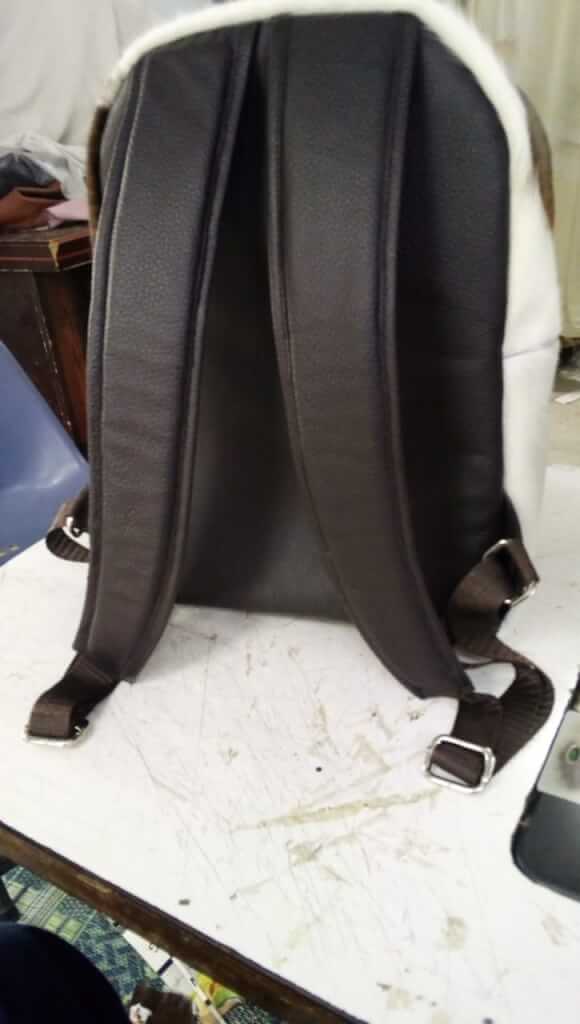 Tan cowhide sphere rucksack padded straps