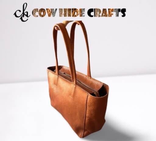 Tan grain leather bag zip closure